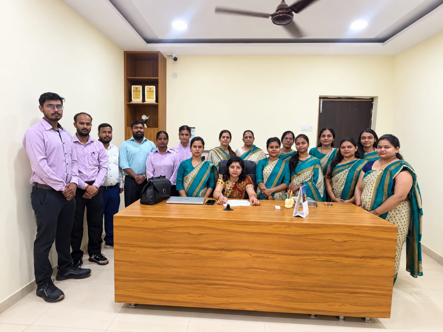 The Global Sparks teaching staff with the Principal in her office